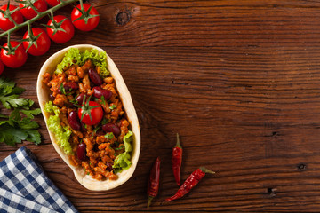 Buritos in stuff stands.