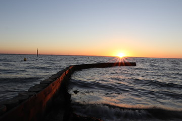 Obraz premium Coucher de soleil sur le bassin d'arcachon
