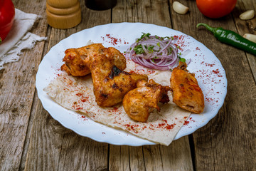 chicken kebab on board