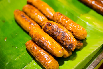 Sour sausage on Trang market