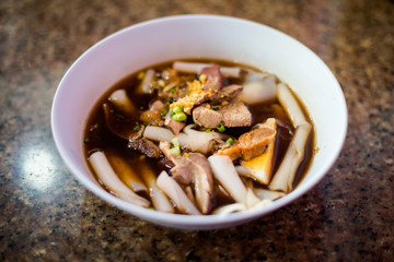 Dark pork noodle soup Thailand