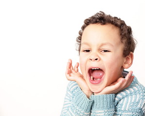 little boy yawning with textured background