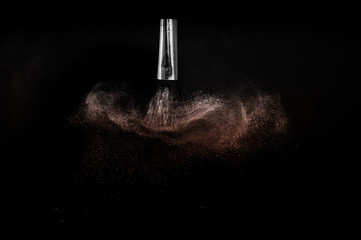 Living Coral Color of the year 2019, powder splash and brush for makeup artist or beauty blogger in black background