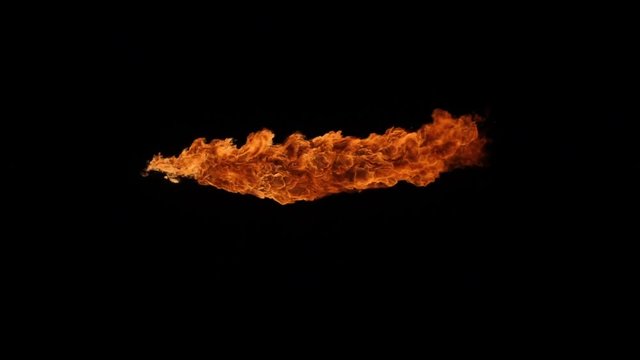 Fire ball explosion, high speed camera, isolated fire flame on black background, slow motion.
