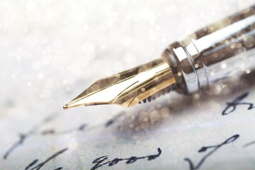 Close-up of Vintage Fountain pen on paper for business