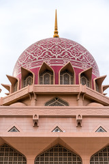 Fototapeta na wymiar Putra Mosque on 29 December 2018, Putra Mosque or known as Pink mosque is located in Putrajaya Malaysia and it is one of main attraction of local and foreigner visitors.