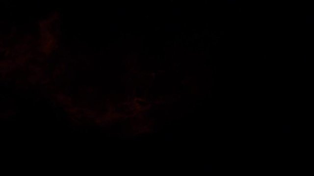 Fire ball explosion, high speed camera, isolated fire flame on black background, slow motion.