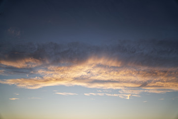 Sky with clouds and sun on winter sunset