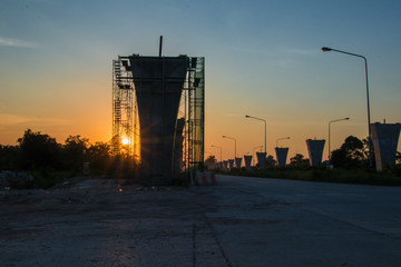 Construction crane and girder of bridge construction site.New expressway construction site and...