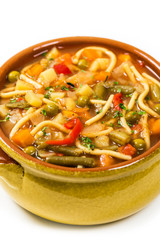 Vegetarian Vegetable Soup Isolated on a white background. Selective focus.