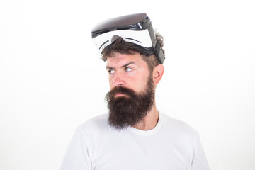 Portrait of young man wearing vr goggles, experiencing virtual reality using 3d headset. A person in virtual glasses flies in room space. Virtual reality headset.