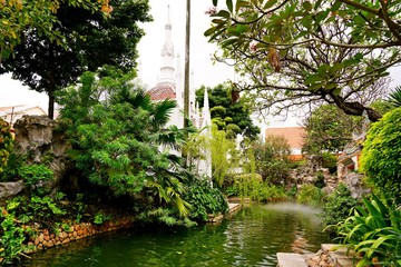 Fototapeta na wymiar Garden in Wat Prayurawongsawat Worawihan,Bangkok,Thailand