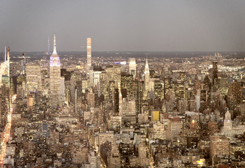 Fototapeta premium Night aerial view of Midtown Manhattan from a high vantage point, New York City