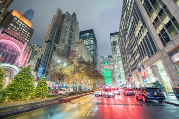 NEW YORK CITY - NOVEMBER 30, 2018: Night traffic along Park Avenue in Manhattan. The city attracts...