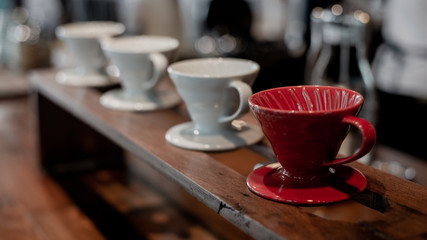 cup of coffee on wooden table