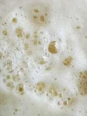 schiuma di una bevanda gassata birra