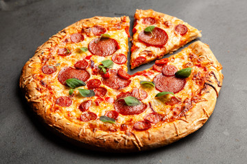 Pizza with salami and chorizo