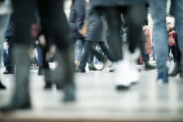 Crowd of people walking along central station during peak hours. Business concept