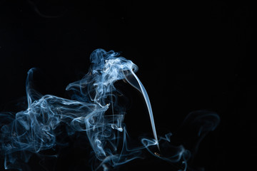 Fototapeta premium White smoke on black background