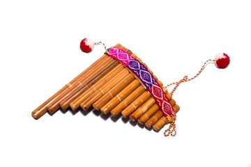 Flute - folk instrument from Peru and Bolivia. Close-up. Isolated on white background. © woff