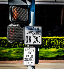 diagonal crossing crosswalk sign