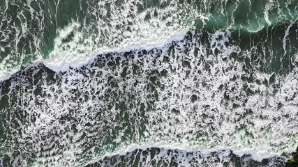 Aerial overhead view of beautiful breaking ocean waves