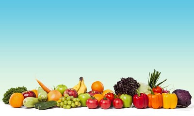 Colorful ripe vegetables and fruits isolated on white