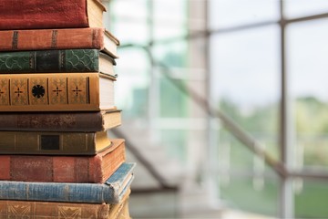 Collection of old books  on background