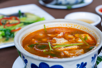 Tom Yum chicken in restaurant