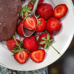 ice cream and red strawberries (dessert) - berries are ripe, juicy. copy space. top