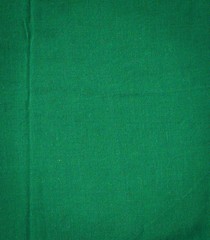 Green crumpled cotton texture from the handkerchief