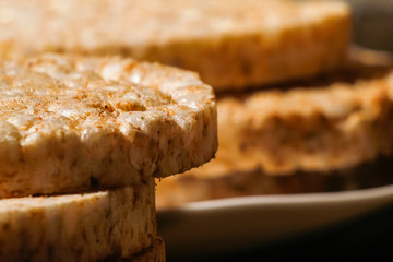 Salty rice crackers galettes with spices. Tasty salty healthy biscuits.