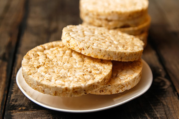 Fototapeta na wymiar Salty rice crackers galettes with spices. Tasty salty healthy biscuits.