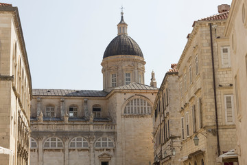 Fototapeta na wymiar DUBROVNIK, CROATIA - AUGUST 22 2018: Dubrovnick old town, with Cathedral rooftop