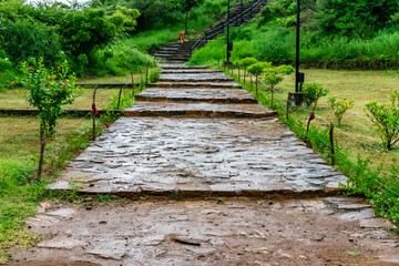 stairs towards to temple in garden making with stone looking awesome after rain felled. 