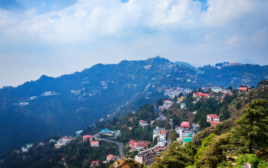 An Aerial landscape view of Mussoorie or Mussouri hill top peak city located in Uttarakhand India with colorful buildings