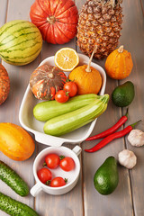 Assortment of Colorful  fresh fruits and vegetables,copy space. Detox, dieting, clean eating, vegetarian, vegan, fitness, healthy lifestyle concept. Fresh farmers market. Healthy food. Vitamins