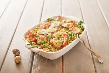 Vegetarian Vegetable pasta Fusilli with zucchini, tomatoes and avocados. Raw vegan pasta. Spaghetti. Italian food. Italy. Roma. Fine dining. Healthy food. Fresca Pasta. Vegetarian. Healthy food
