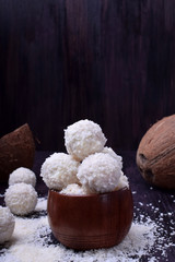 Fototapeta na wymiar White sweets sprinkled with coconut flakes
