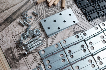 Elements and tools for furniture assembly