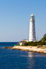 old lighthouse by the sea