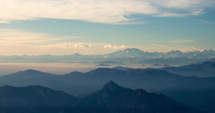 Panorama of the Italian Alps with Monte Rosa and the Lombard pre-Alps seen from the summit of the Resegone. Time lapse.