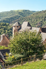 Streets of Conques in the mountains of southern France on a sunny day