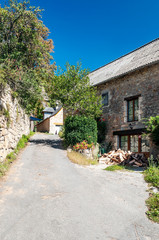 Fototapeta na wymiar Streets of Conques in the mountains of southern France on a sunny day