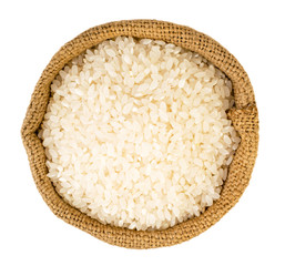 Rice in a bag on a white. The view from the top.