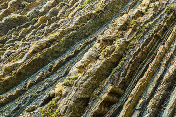 Background of teeth of rocks on the coast of Black sea.