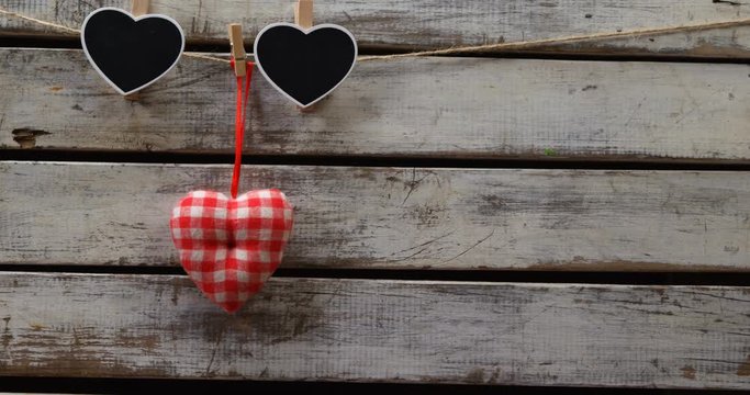 Heart shaped decoration pinned on a rope 4k