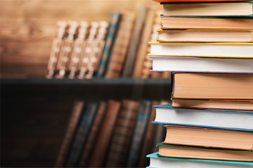 Old Books stacked on background.