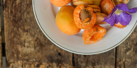 apricots and apricot juice - ripe fruit, juicy. copy space. top