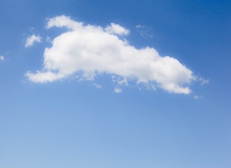 Fantastic view of the azure sky on a sunny day with fluffy clouds.